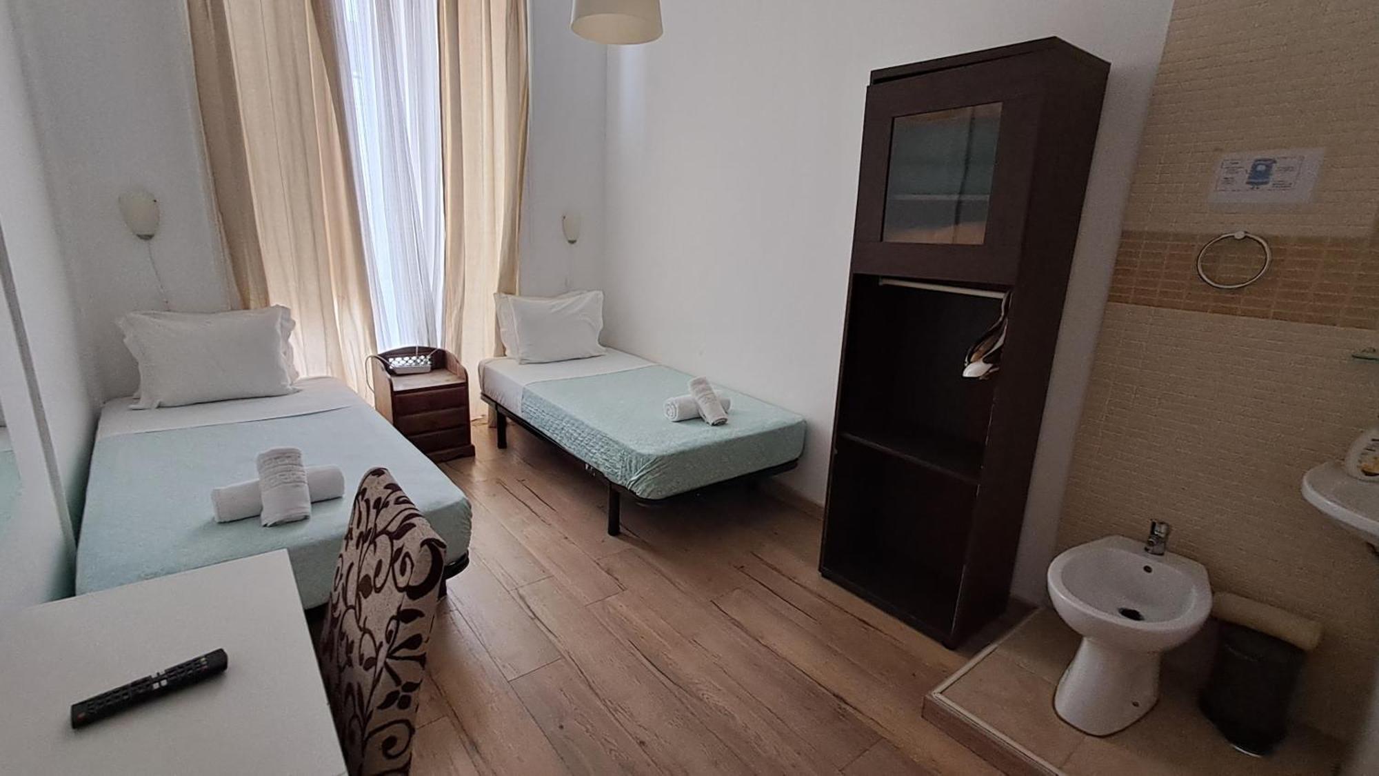 Double or Twin Room with Shared Bathroom,1704854664:JPEG